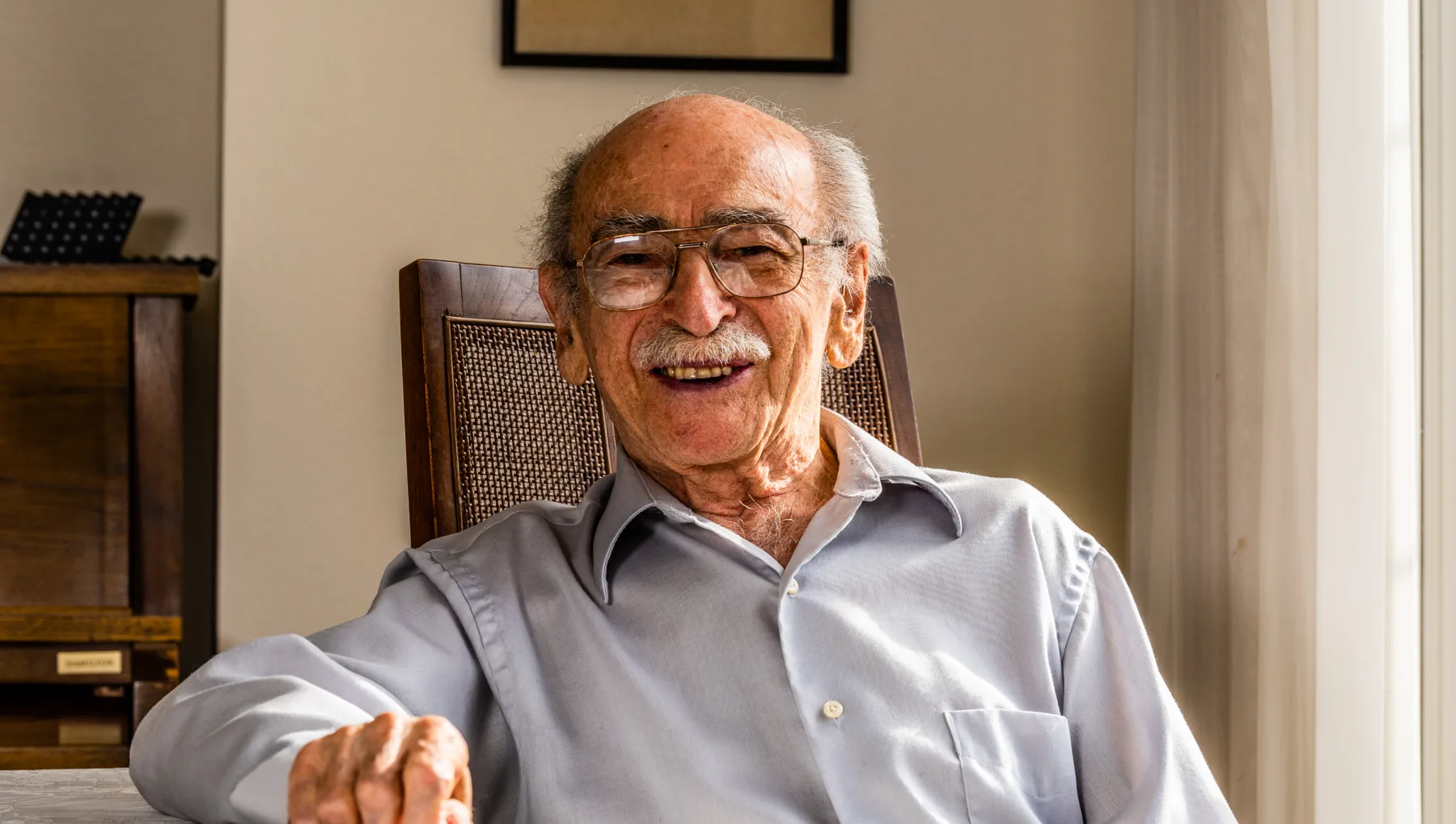 Smiling elderly man in a care home